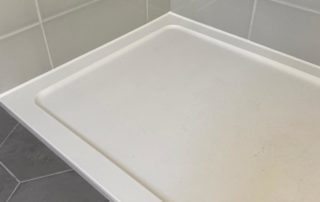 Sealant to shower tray