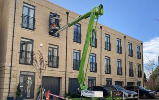 Mastic company with cherry picker